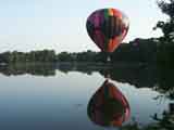 Hot air balloon lifting off from Taylor Lake